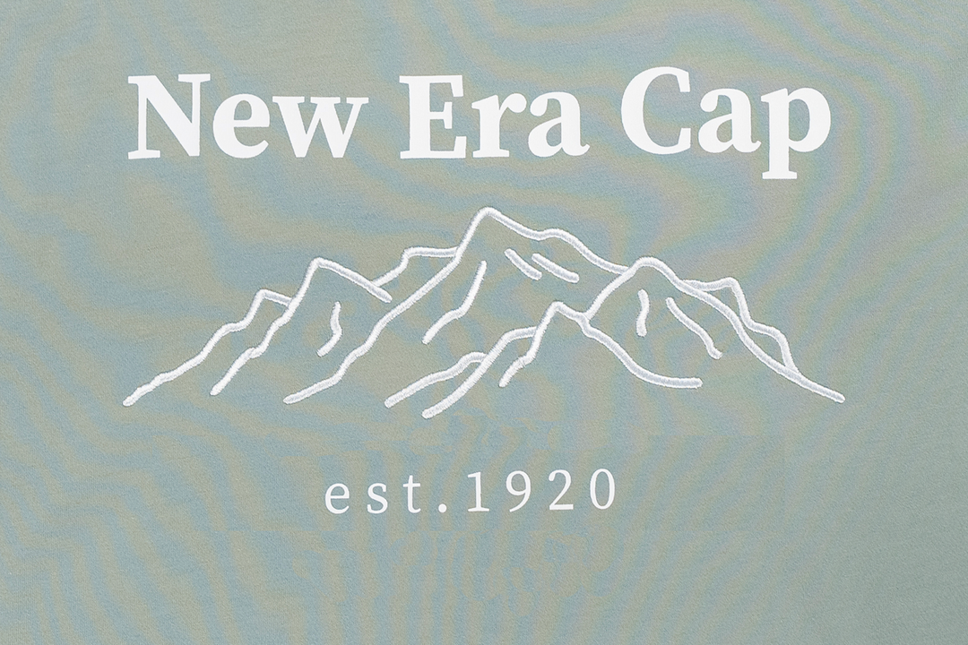 NEW ERA เสื้อยืดแขนสั้น รุ่น NEW ERA MOUNTAIN EDGE EVEREST GREEN PERFORMANCE SHORT SLEEVE T-SHIRT