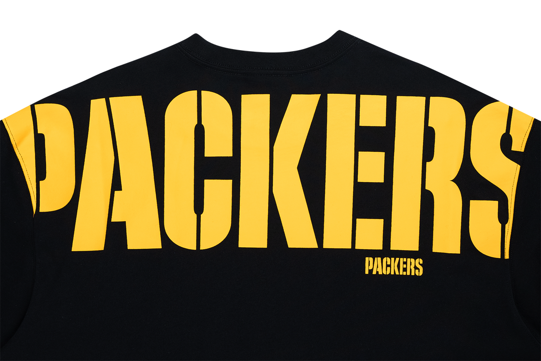 NEW ERA เสื้อยืดแขนสั้น รุ่น GREEN BAY PACKERS NFL BLACK OVERSIZED SHORT SLEEVE T-SHIRT