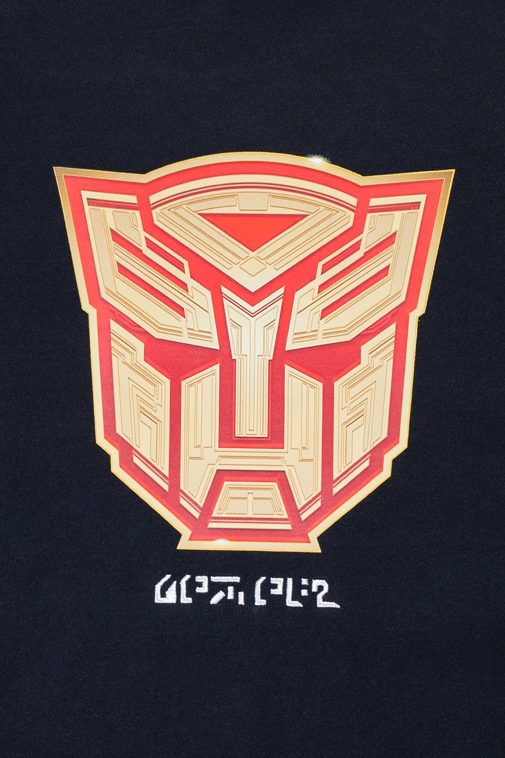 New Era เสื้อยืดแขนสั้นรุ่น New Era x Transformers One Autobots Black Short Sleeve Tee