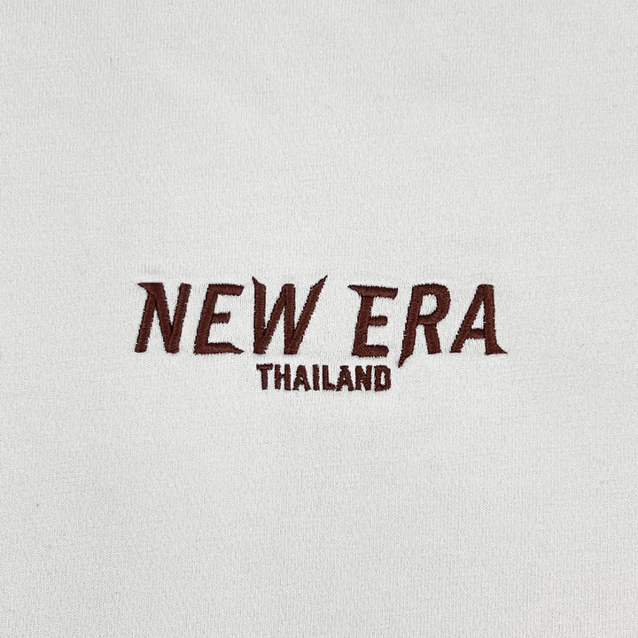 เสื้อยืดแขนสั้น New Era รุ่น PHI TA KHON 10Th Anniversary Ivory Short Sleeve Tee