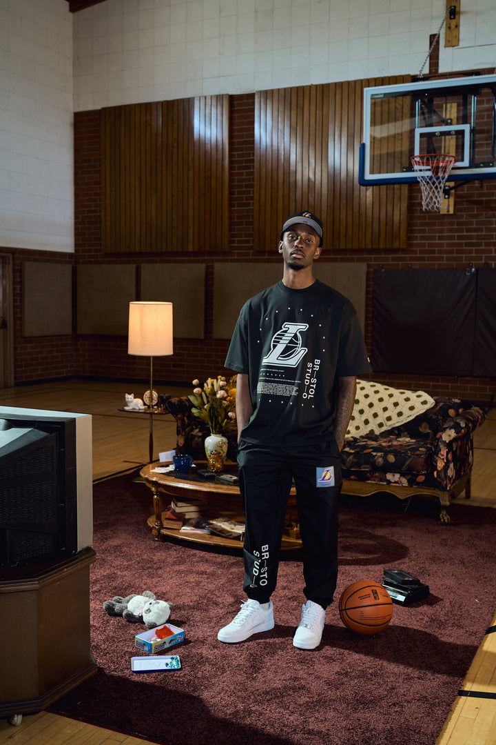 New Era เสื้อยืดแขนสั้นรุ่น BRISTOL x NBA 2024 Los Angeles Lakers Black Short Sleeve Tee